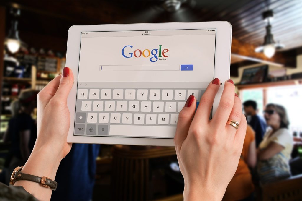 An iPad with the Google homepage displayed on its screen