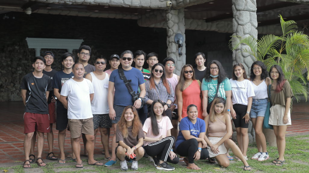 Team GR in front of an open function hall