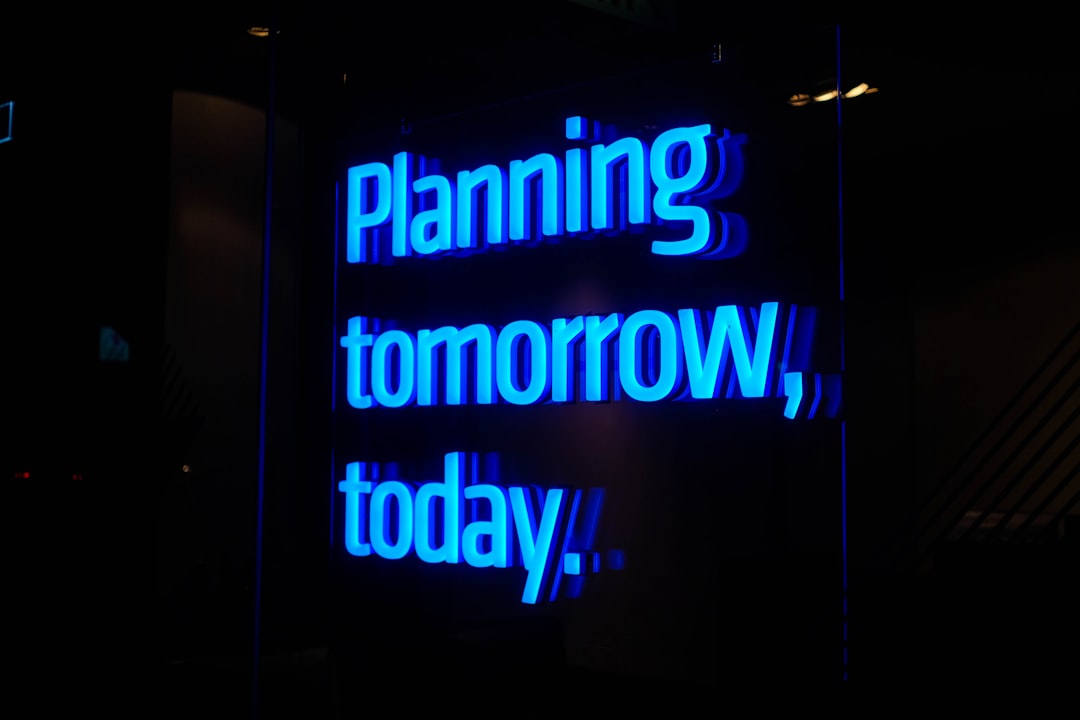 Growth Rocket a neon sign that says planning tomorrow, today