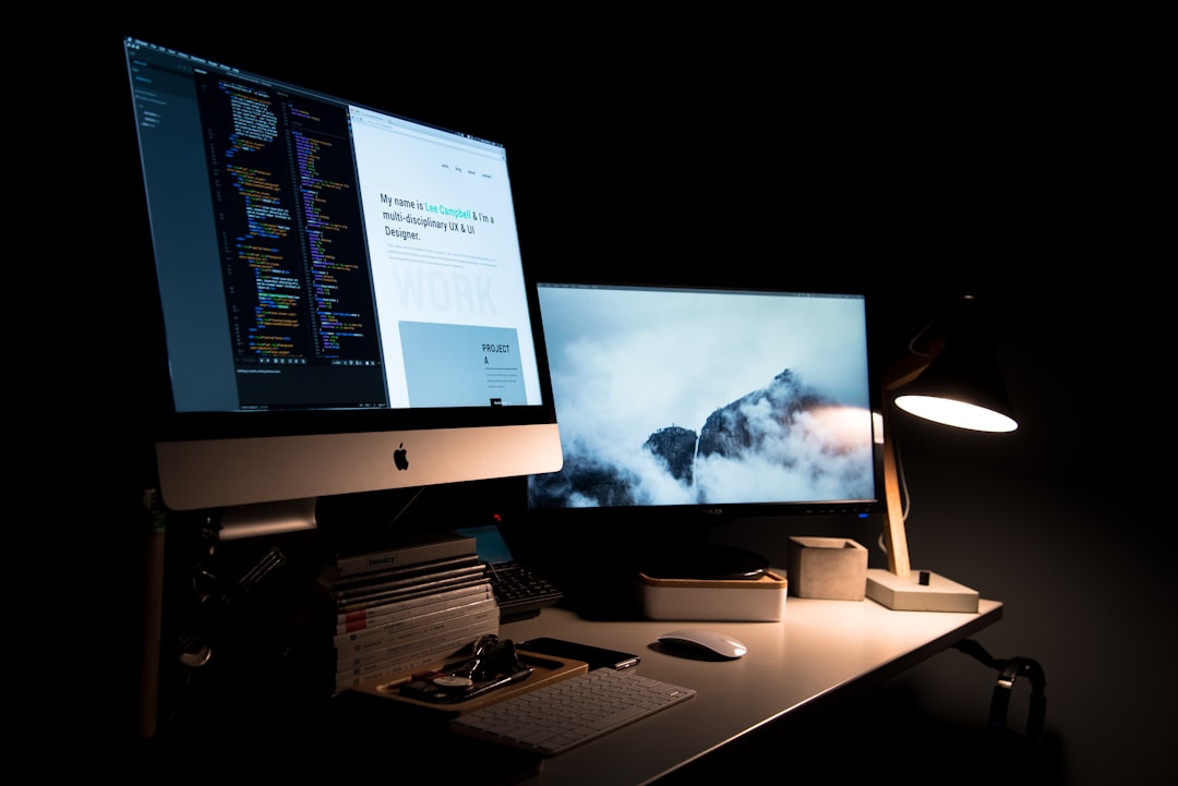 Growth Rocket silver iMac turned on inside room
